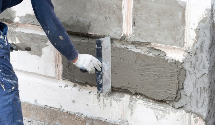 Expert repairing foundation wall